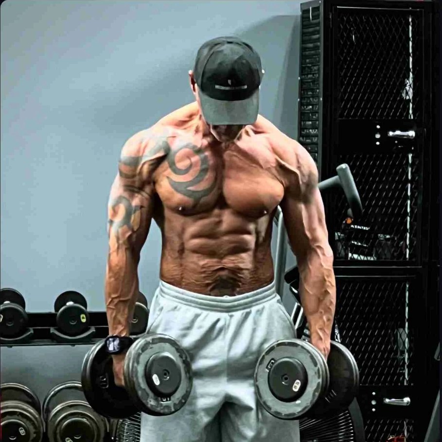 Joe Rufin training with dumbbells on the R1 floor